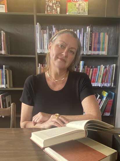 Erika Caputo serves as library director