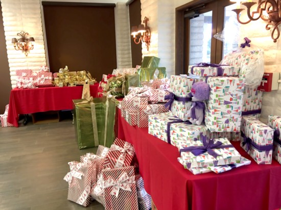 Stacks of presents ready for presentation to Families of Active Military. 