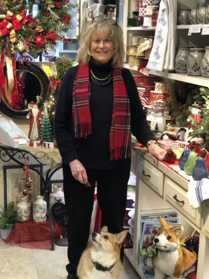 Emmy Lou DeBari and her Corgi, Holly inside Emmy Lou's.