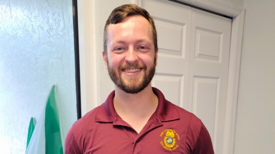Assistant State Attorney Ethan Dunn was recognized for his help protecting children with a DOH Challenge Coin