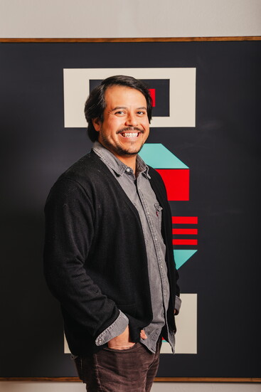 Owner of VIVA Pottery, Adrian Quintanar, inside his studio.