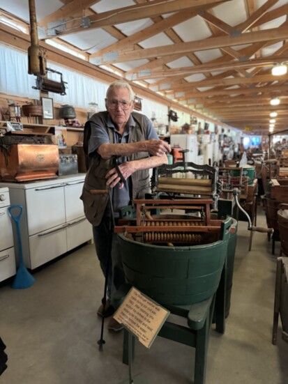 Lee Maxwell at the helm of one of his 1,400 washing machines at his long-running museum