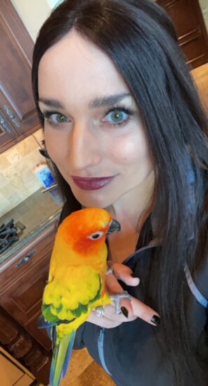 Wendy Witt (@the_parrot_lady)  & Thyme a Sun Conure Parrot
