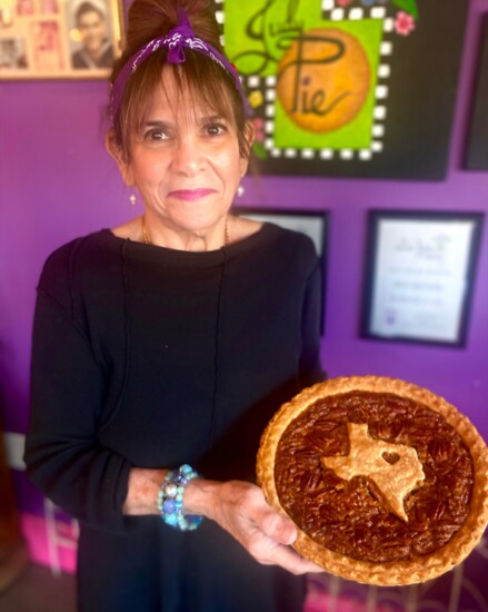 Judy featuring a beautiful Texas pecan pie.