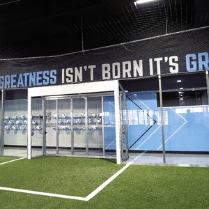 greatness%20phrase%20on%20wall-300?v=1
