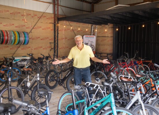 Paul Wheatland of Pedego shows off his inventory of e-bikes in Wauconda.