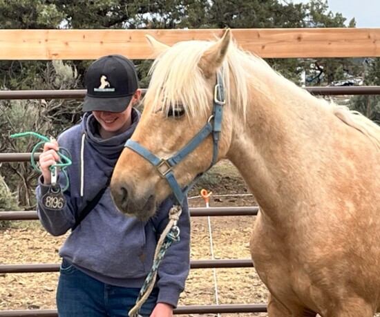 A momentous day for Rowden and Silas as she got close enough to remove his BLM ID tag on Day 8. Photo credit: Tabby Rowden