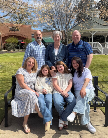 Bonnie Dobbs, owner of Insurance & Other Red Tape with her family 