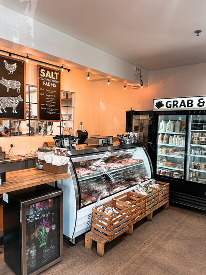 The shop offers local meat, grab & go meal kits and deli sandwiches.