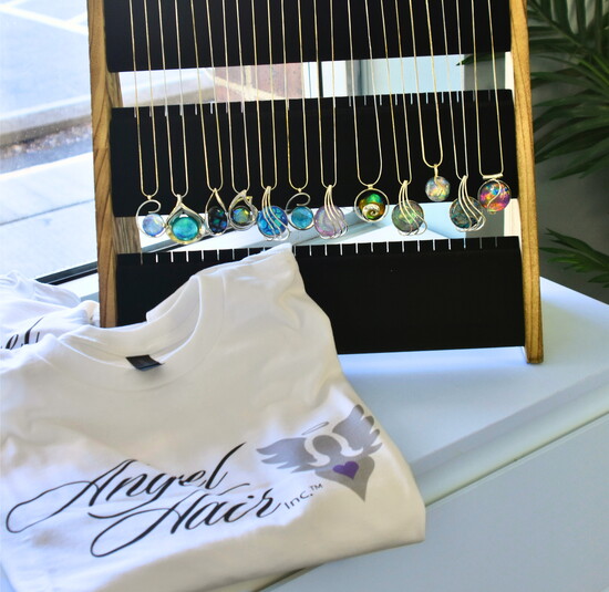 Silver and Glass Jewelry made by local artist, Jarby Blackmun. 100% of the sales go directly to the Angel Hair Foundation