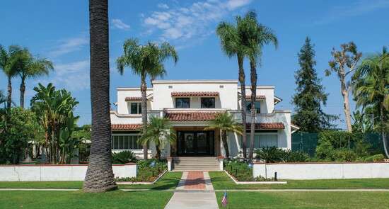 A Spanish Revival in Los Cerritos blending design elements from Spanish missions, Mediterranean villas, Moorish palaces and Mexican colonial architecture.