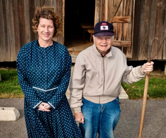 Historical reenactors Angie Underwood and Lee Bassett await schoolkids in 2014.