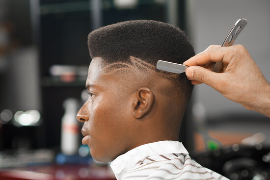 A skilled barber brings precision and personal style together with every cut.