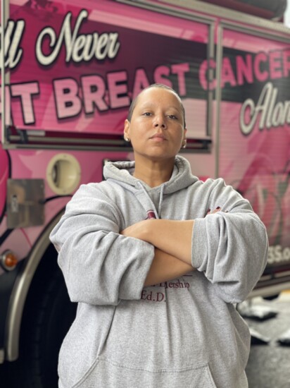 A woman fighting breast cancer participates in a National Cancer Survivors' Day event. 