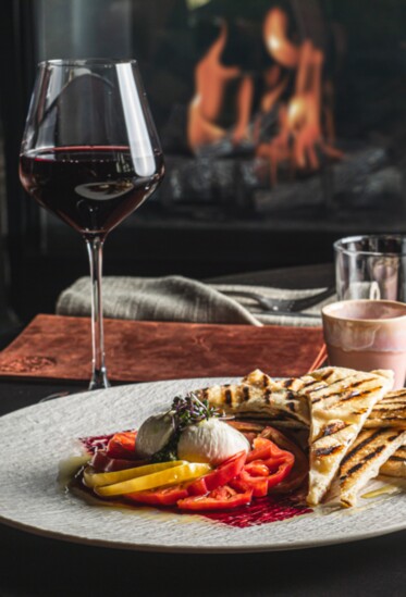 Set the mood for romance with fireside dining, fine wine, and flavorful dishes at The Lodge.