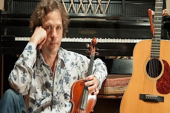 Violinist Will Taylor performs his annual Concert in the Dark.