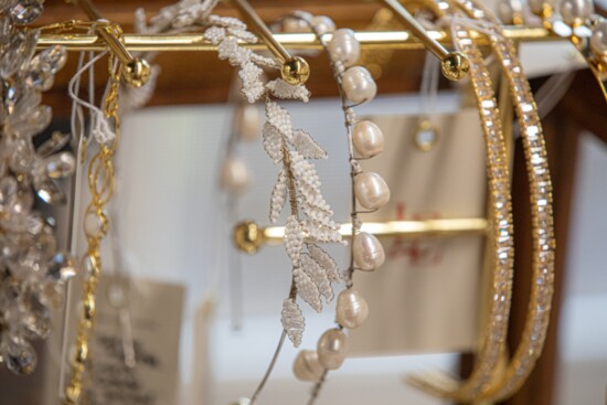 Sparkling accessories lined up to complement gowns.