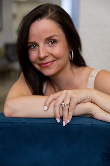Floral-inspired details bring a modern touch to this contemporary marquise diamond ring. Modeled by Sierra Broschart.