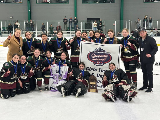 Lyndsey Fry with Arizona Kachinas players, building the future of girls hockey in Arizona.