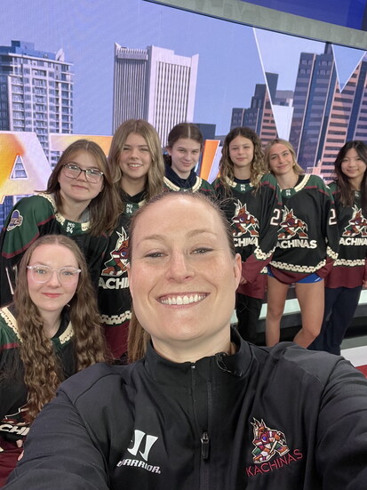 Lyndsey Fry with Arizona Kachinas players, building the future of girls hockey in Arizona.