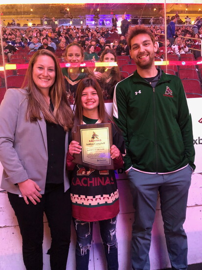Lyndsey Fry alongside Matt Shott, united by a shared belief in building opportunity through hockey.