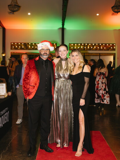Will and Karen Rivera with Mallory Carpenter