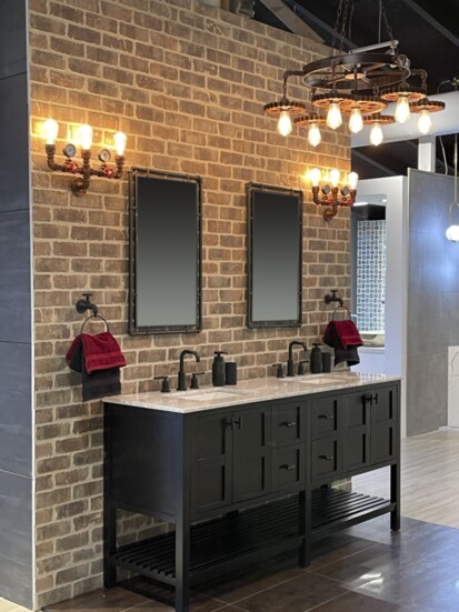 The Industrial Inspired bath showcases unique fixtures + lighting.