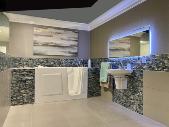 The spa-like Aging in Place bathroom features a walk-in tub.