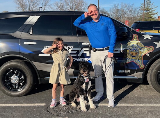 Oliver again but with Oliver’s handler, Sgt. Ryan Cornett