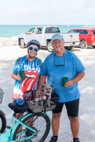 Patti on a bike ride with her owners, Karen & Chuck Daunch.