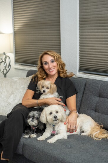 Karli, Cassie & Brindle Cuddled with Lori Bailey, owner of the Contour Day Spa. 