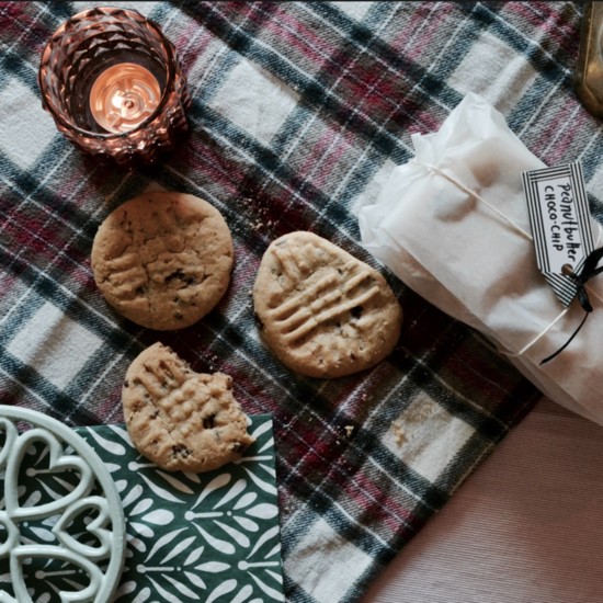 The iconic plaid blanket provides a setting for fall picnics and can be used as an accent in the home.