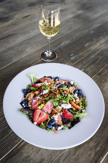 Savor local flavors paired with fine wine in a unique, scenic setting tucked right along the Highland Meadows Golf Course.