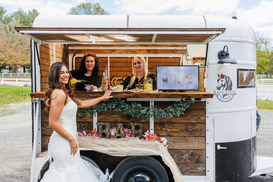 Jamie & Jaimie, Founders of The Mane Event Mobile Bar LLC serving up drinks