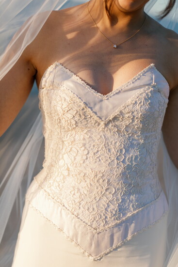 Katherine Fleischhauer’s great‑aunt’s silk wedding gown, reimagined by Pink into a modern heirloom. (Photo by Melissa Stuckey)