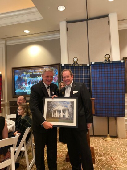 President Bob Hagan presents Bulloch Hall photo to Mayor Kurt Wilson.