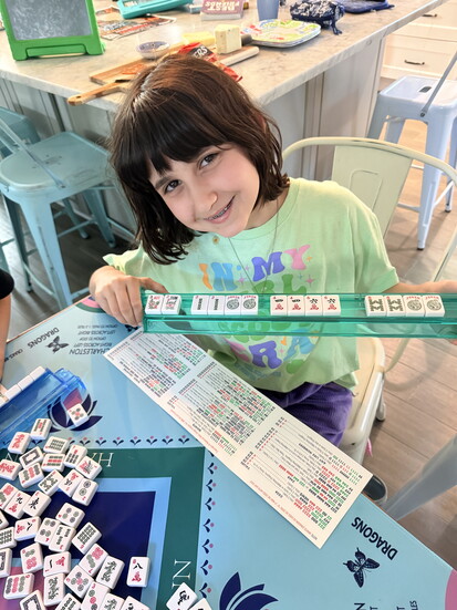 Sidney Rose Weil, 12, enjoys playing mahjong with family and friends.