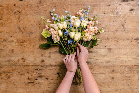 Then, add 3 stems of Spray Rose or rose