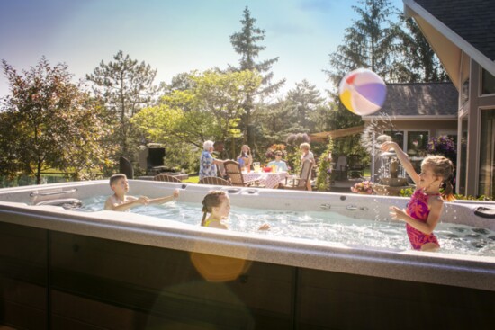 Enjoy family time in a Master Spas swim spa.