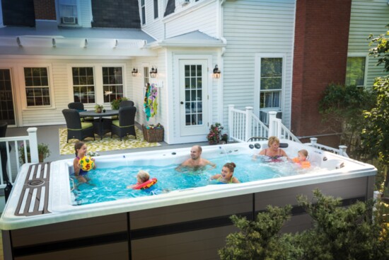 Enjoy family time in a Master Spas swim spa.