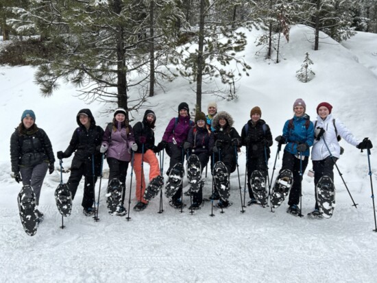 Highschool girls snowshoeing into Gold Fork Hot Springs.