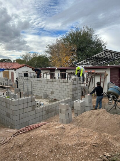 Stucco construction is one of many options. Here a masonry build is underway.