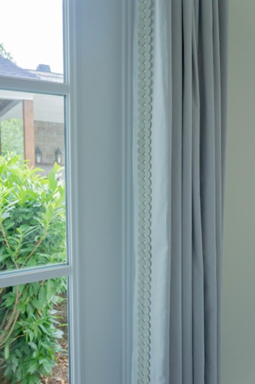 Bright idea: Custom velvet window treatments add texture to the space.
