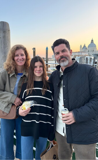 Dr. Meagan with her daughter, Harper Gammill, and husband, David Gammill, grateful for her family's love and support.