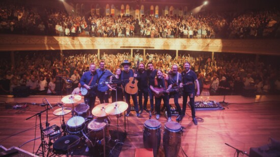 John Driskell Hopkins Band on stage with an adoring audience at Ryman Auditorium in Nashville, TN.  
