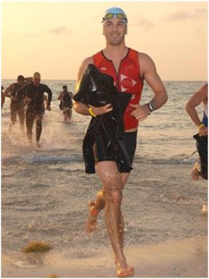 Saul finishing the 2.4 mile swim.