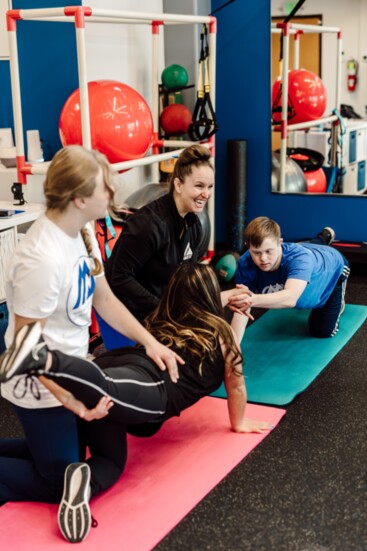 Partner hip strengthening and balance training.