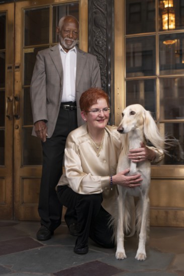 Owners Blake and Mueller with Stewart the Saluki.