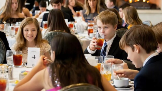Formal dining skills are reinforced through Cotillion classes.
