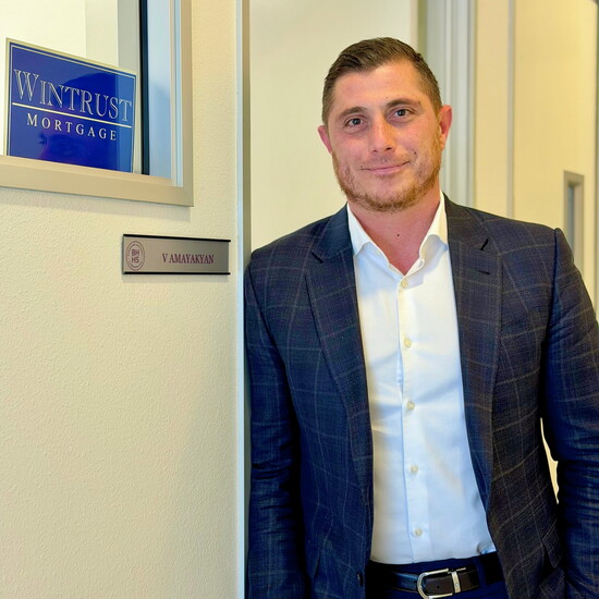V. Amayakyan outside his Wintrust Mortgage office.